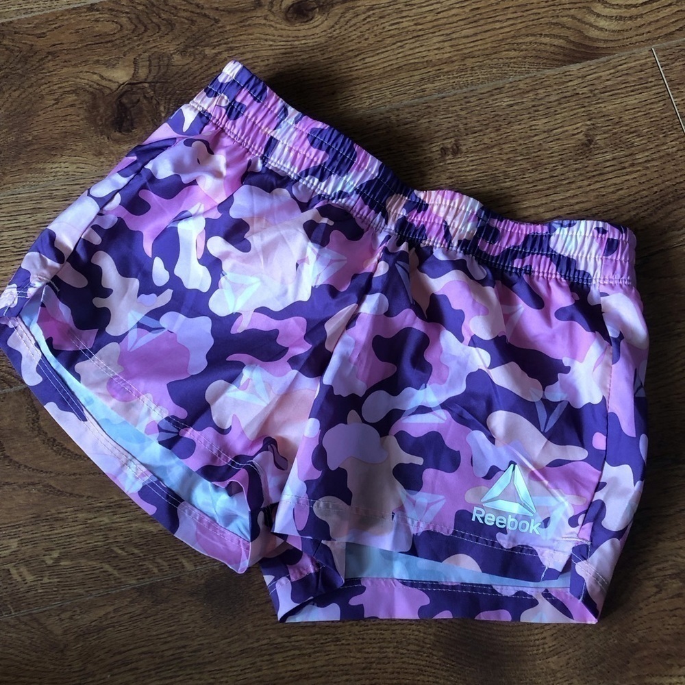 Reebok pink & purple camo print activewear shorts in size S (6/6x)
